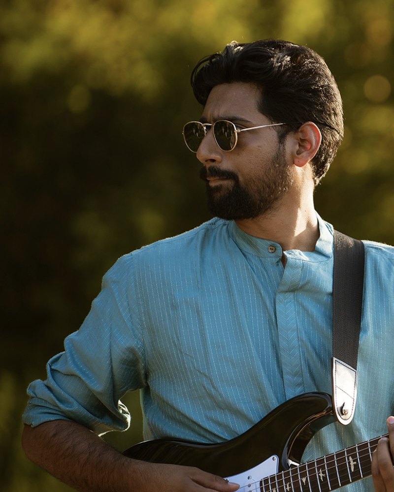 Varun Guru with his electric guitar